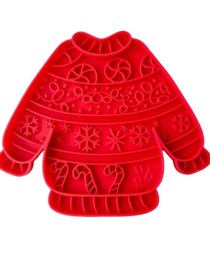 Tapis à lécher Ollie B. Good en silicone alimentaire rouge, forme pull de Noël, avec ventouses antidérapantes